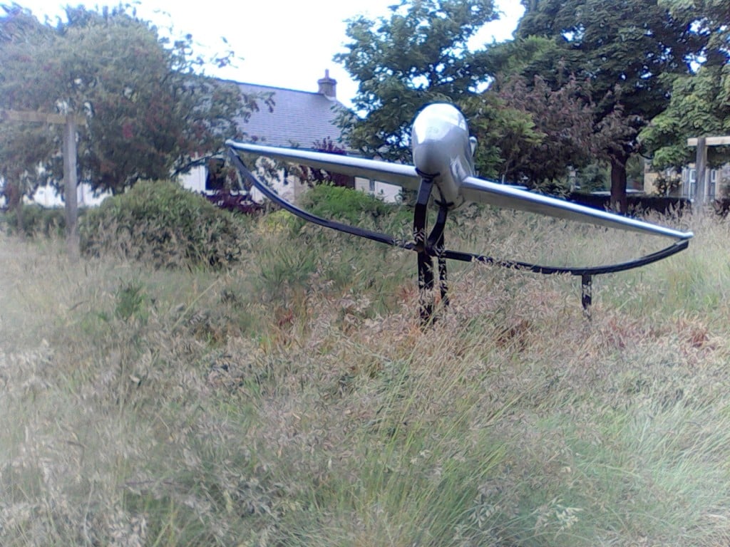 How the overgrown gardens looked before work began.