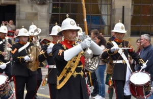 The parade steps off from Port Street led by the Band of the Royal Marines Scotland.