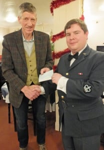 Presentation of the £900 cheque to Mr Fraser Fotheringham from CRY by Warrant Officer ATC Colin Boyle.