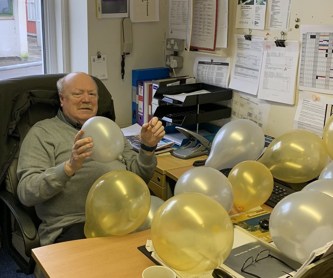Bob Hallum with balloons