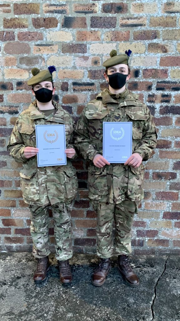 Two cadets with awards.