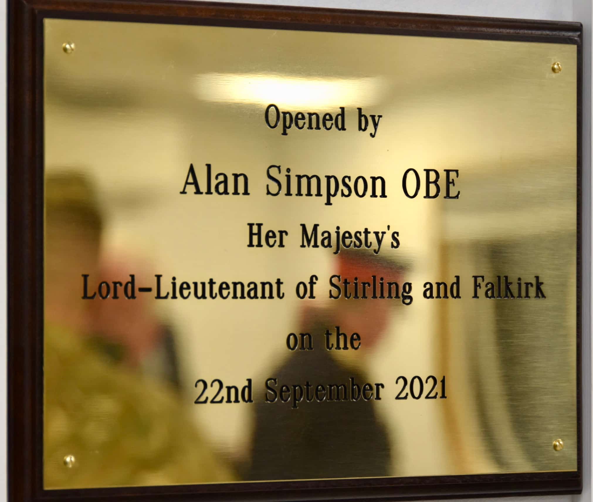 Decorative plaque to mark cadet centre opening.