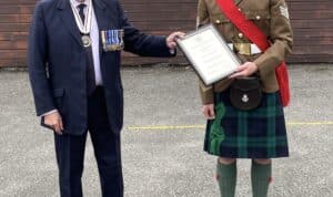 Sam and Douglas with Lord Lieutenant award.