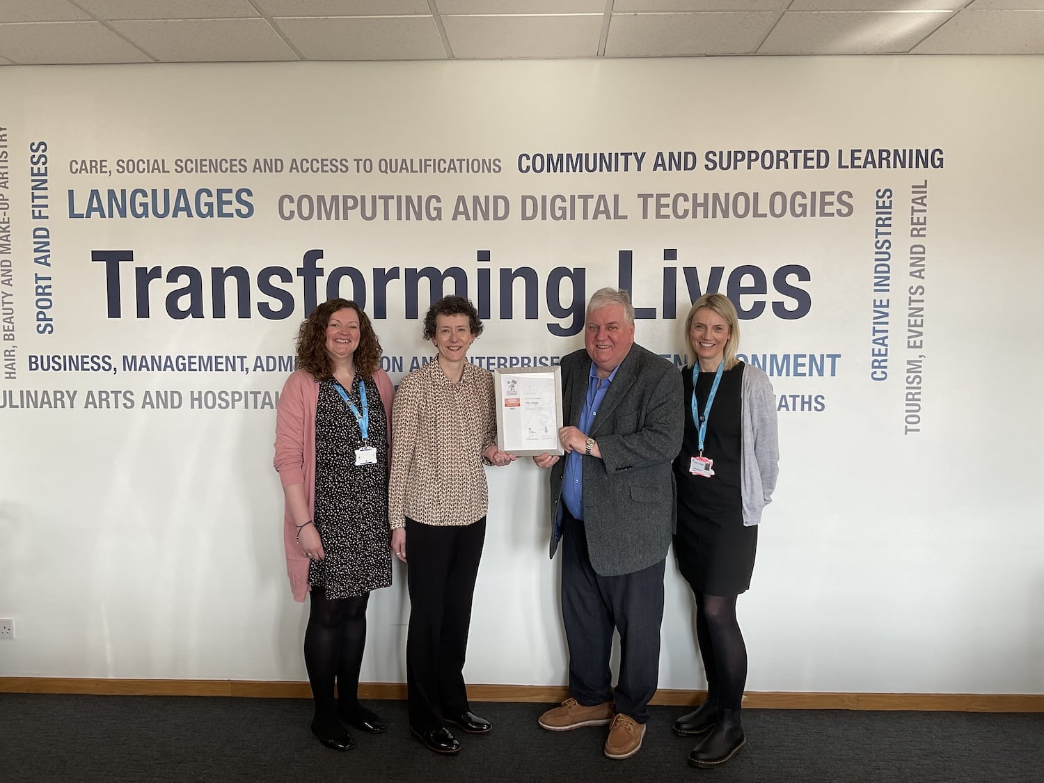 Receiving the award from Roy McLellan on behalf of the college were (main picture, from left) Stefanie Sloan HR Assistant, Zelda Franklin-Hills Director Organisational development & HR, and Allyson Chernouski HR Assistant.