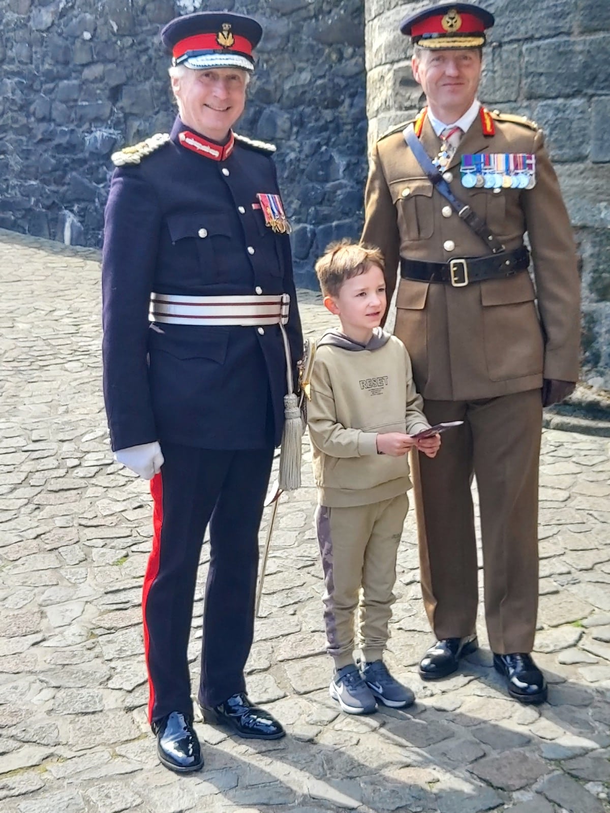 GOS and LL pose with boy.