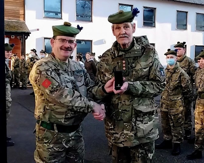 Capt Lucas (right) receiving his 5th Clasp.