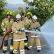 Aviemore cadets using the fire hoses.
