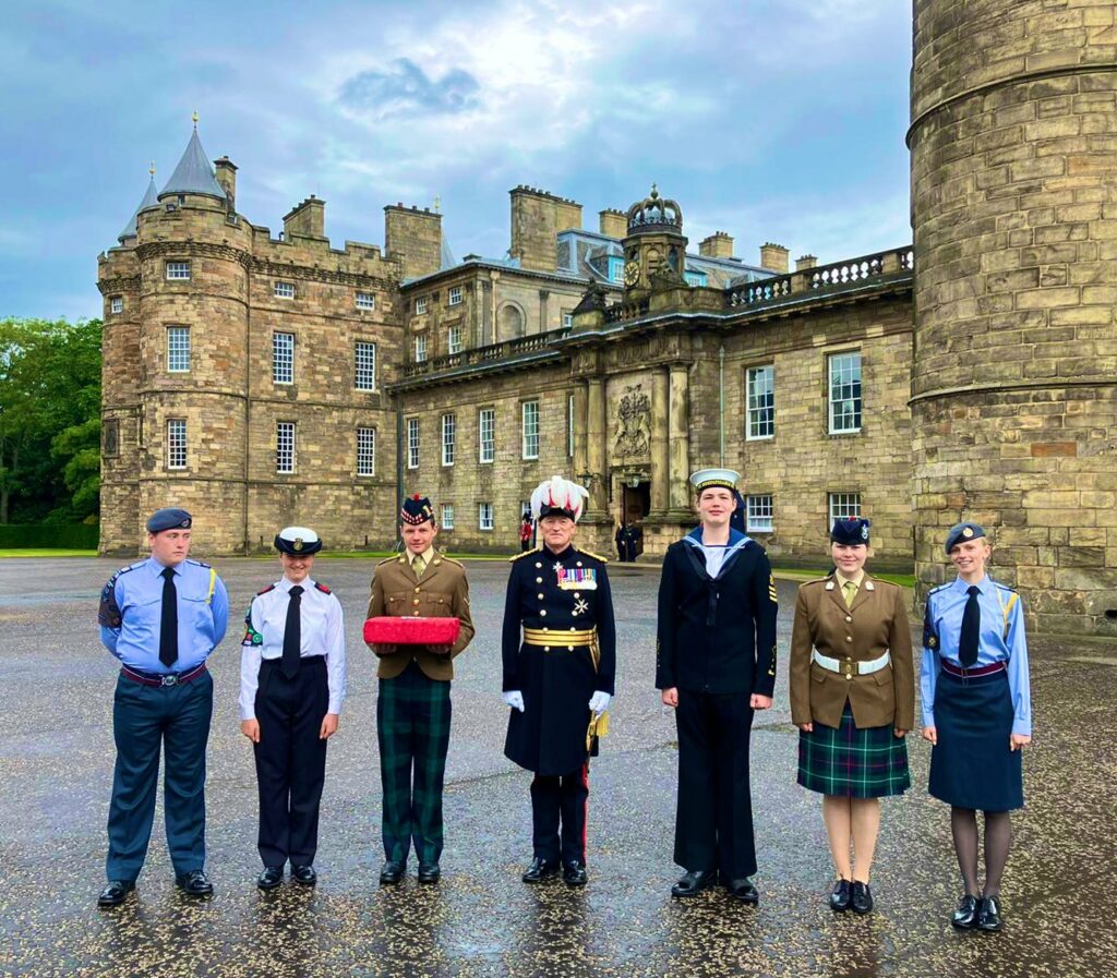 Tri-Service cadets with Maj Gen Alastair Bruce, Governor of Edinburgh Castle.