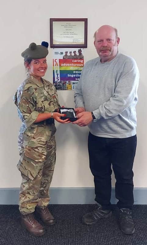 SMI Mackie receives a gift.