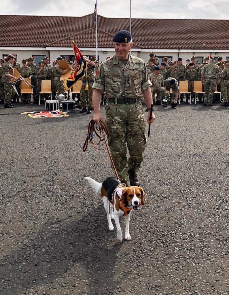 Angus and Dundee Commandant Colonel Scott Dunn with his Beagle-cross Milly.