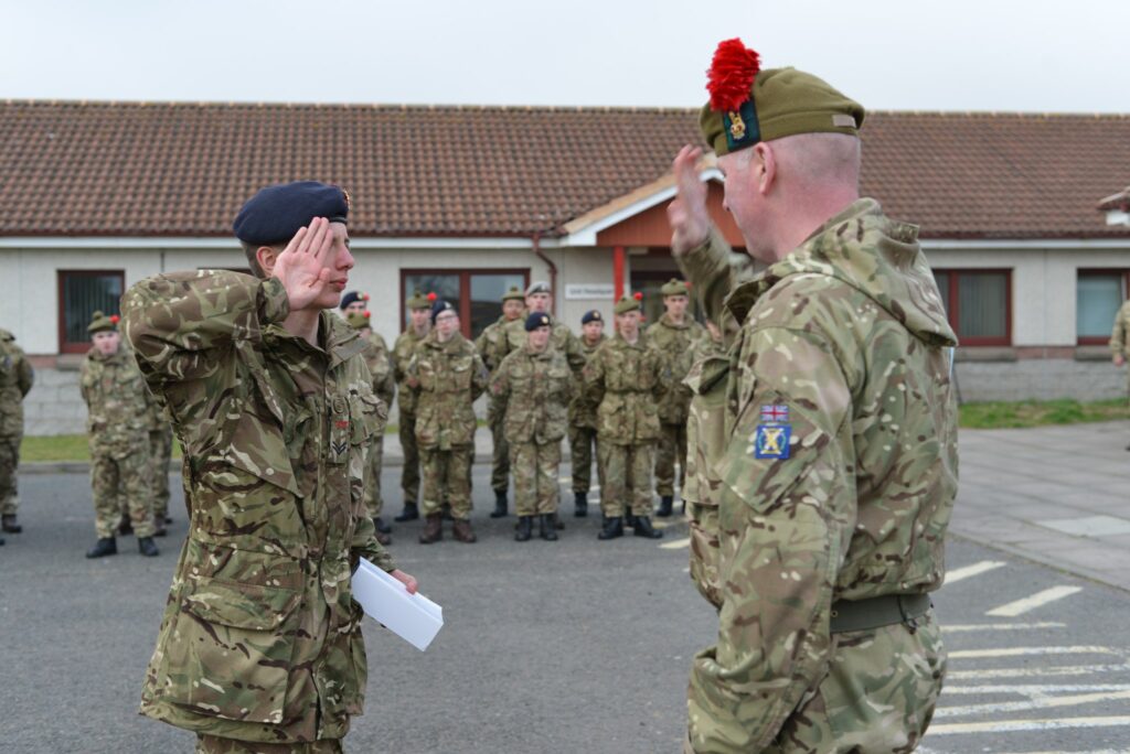 cadet saluting the Commandant