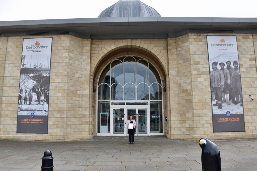 Dundee Heritage Trust Chief Executive in front of Discovery Point