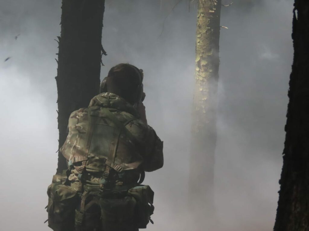 Cadet in smoke.