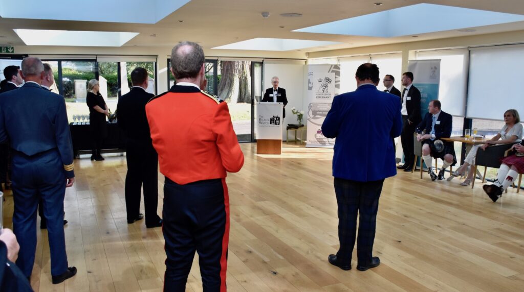 Brigadier (Retd) Mark Dodson deliver a welcoming address to guests.