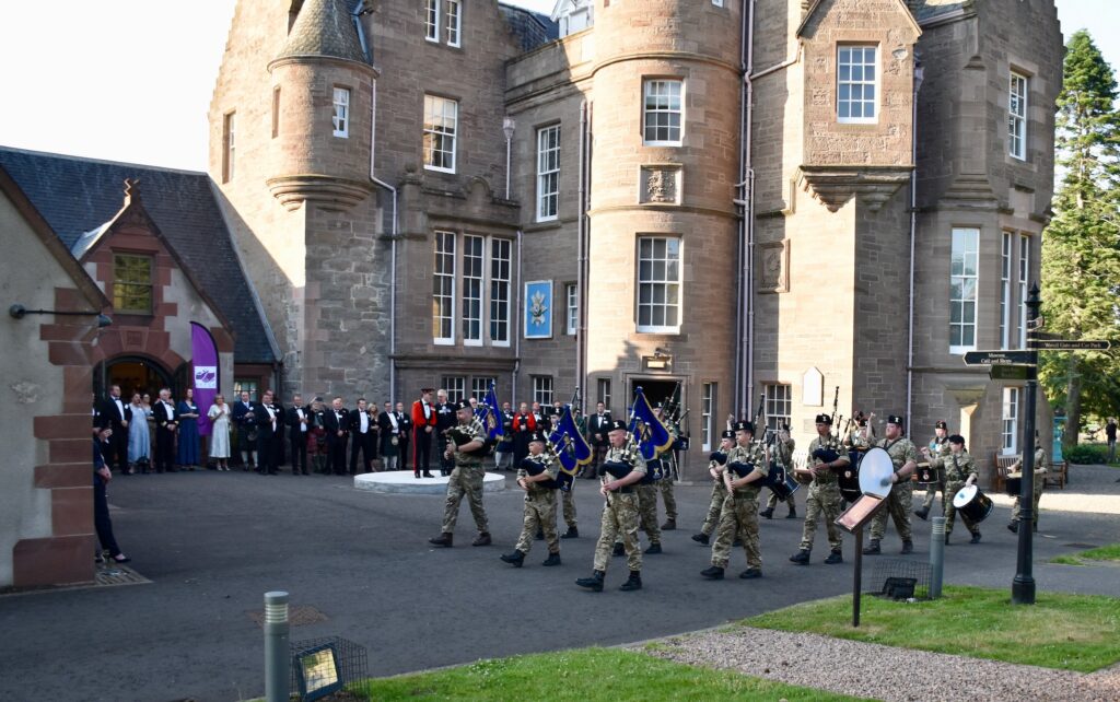 Guests look on as the band performs.