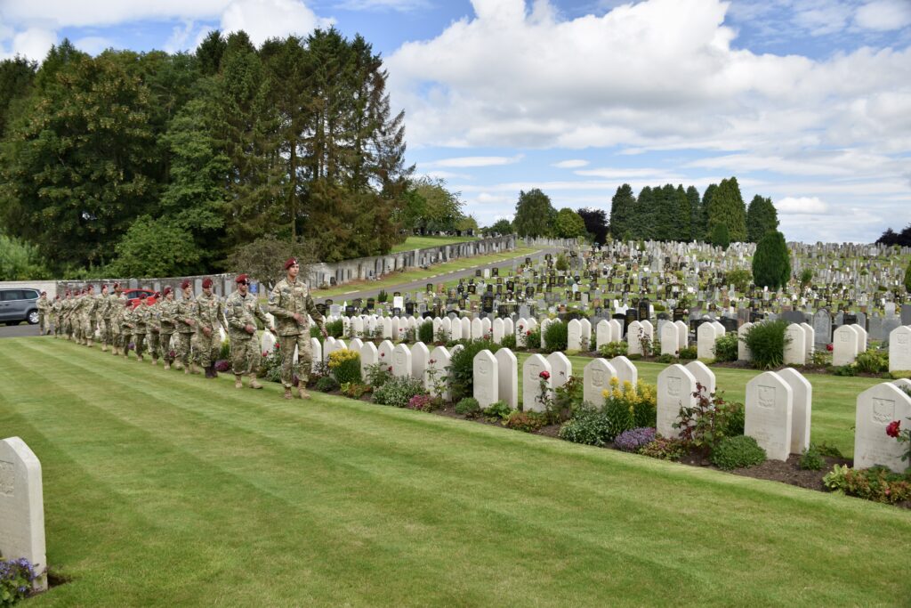 Polish cadets in front of war graves