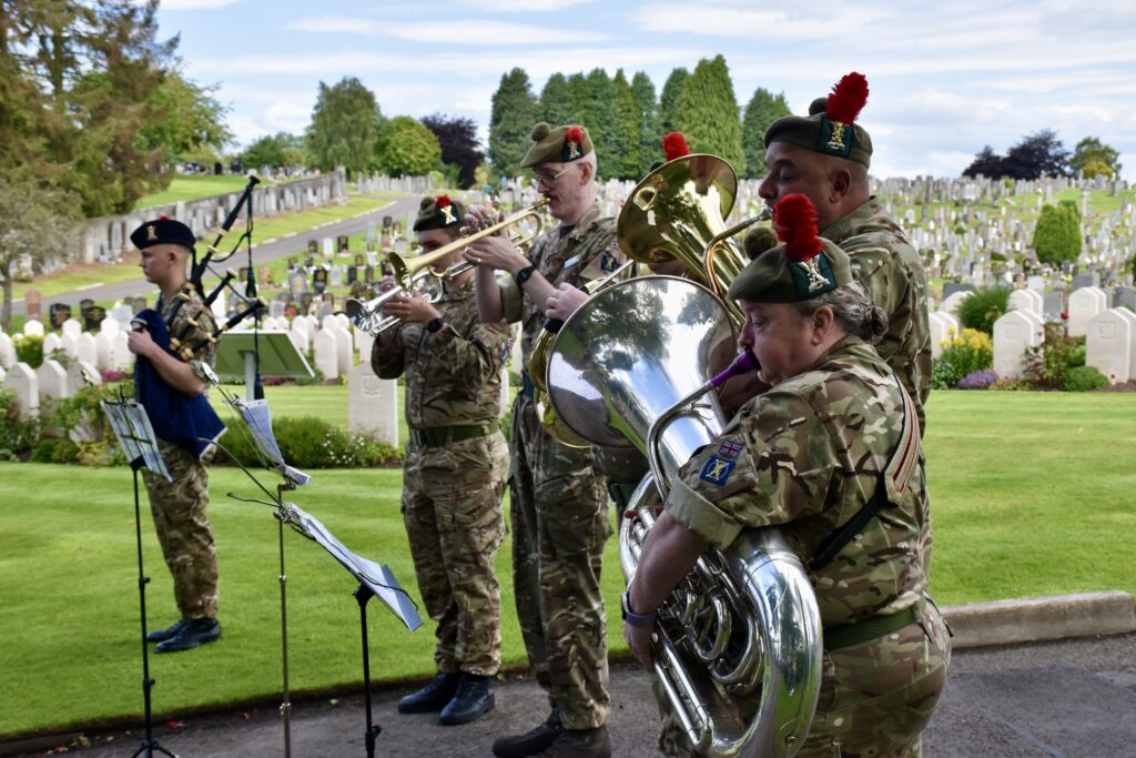 Six Army Cadet Force musicians playing