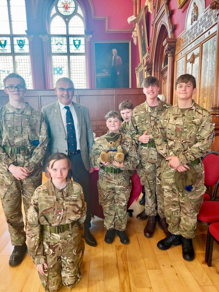 1st Battalion The Highlanders cadets with St Valery Deputy Mayor Benjamin Gorgibus.