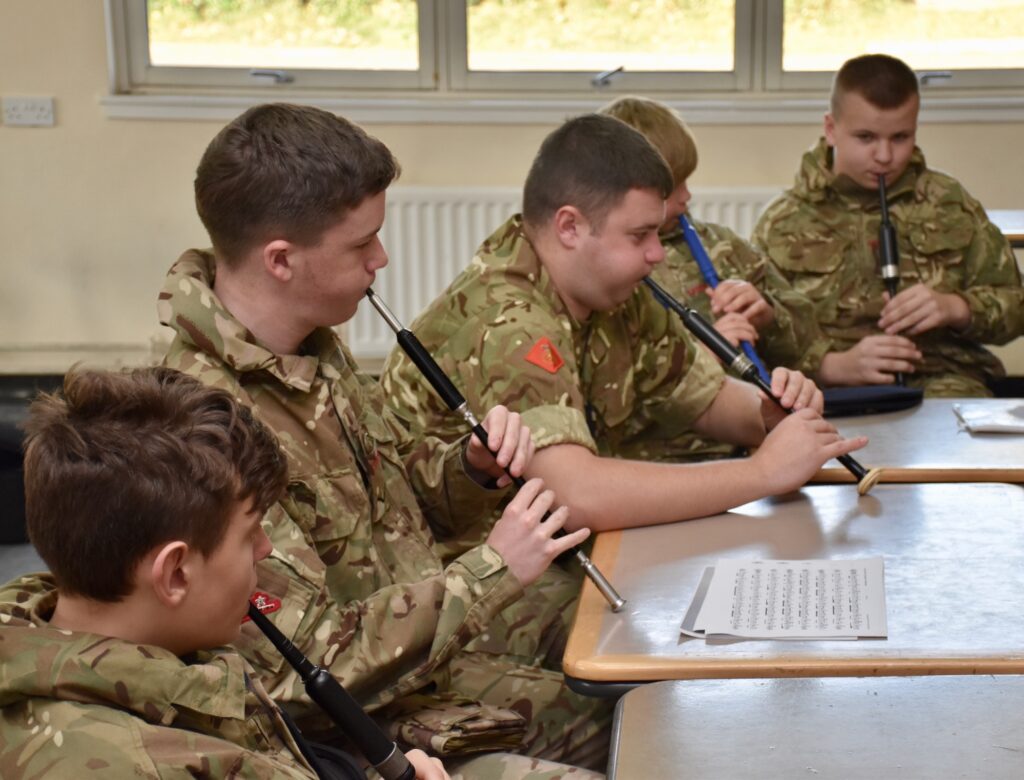 Cadets playing their chanters.