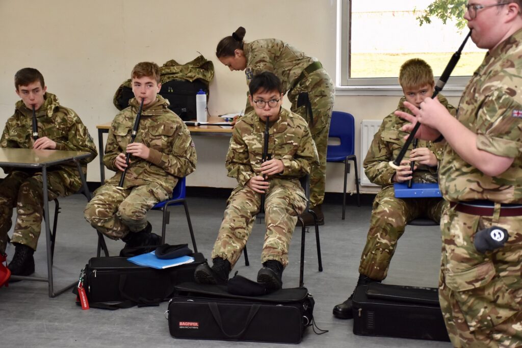 Cadets during piping practice.