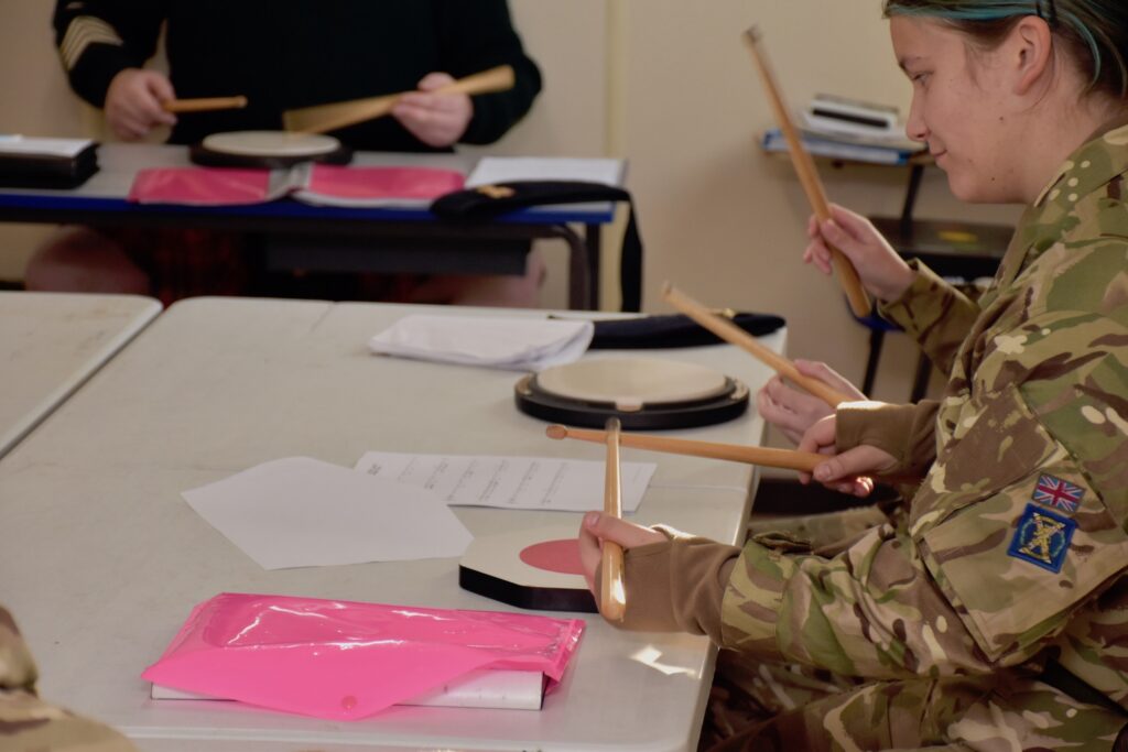 Cadets practising drumming.