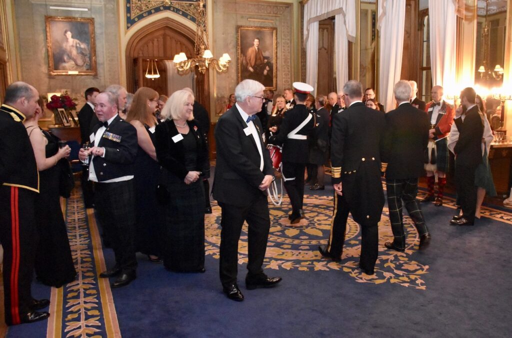 Guests being drummed into dinner.