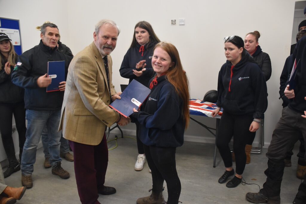 Chris presenting certificate to Geraldine