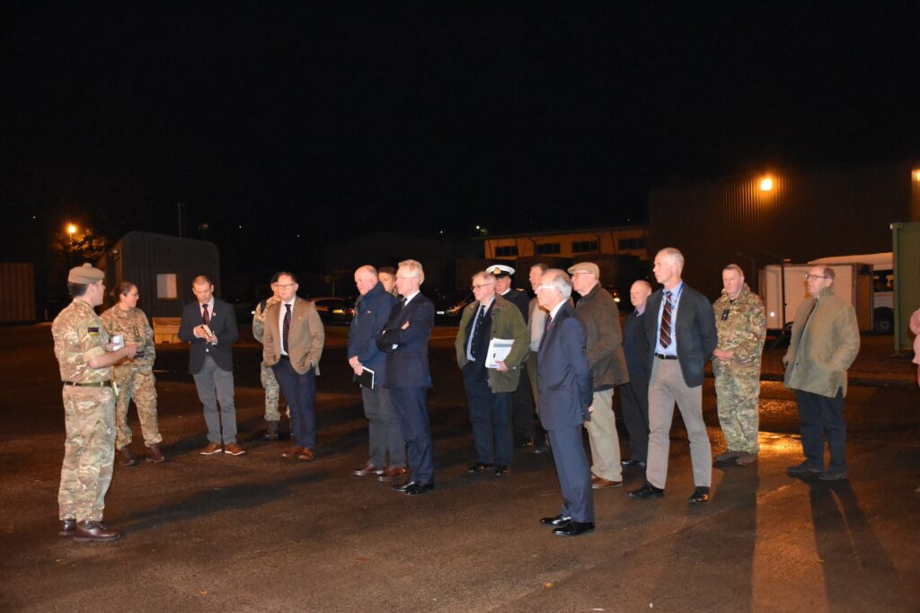 Unit representative briefing attendees outside