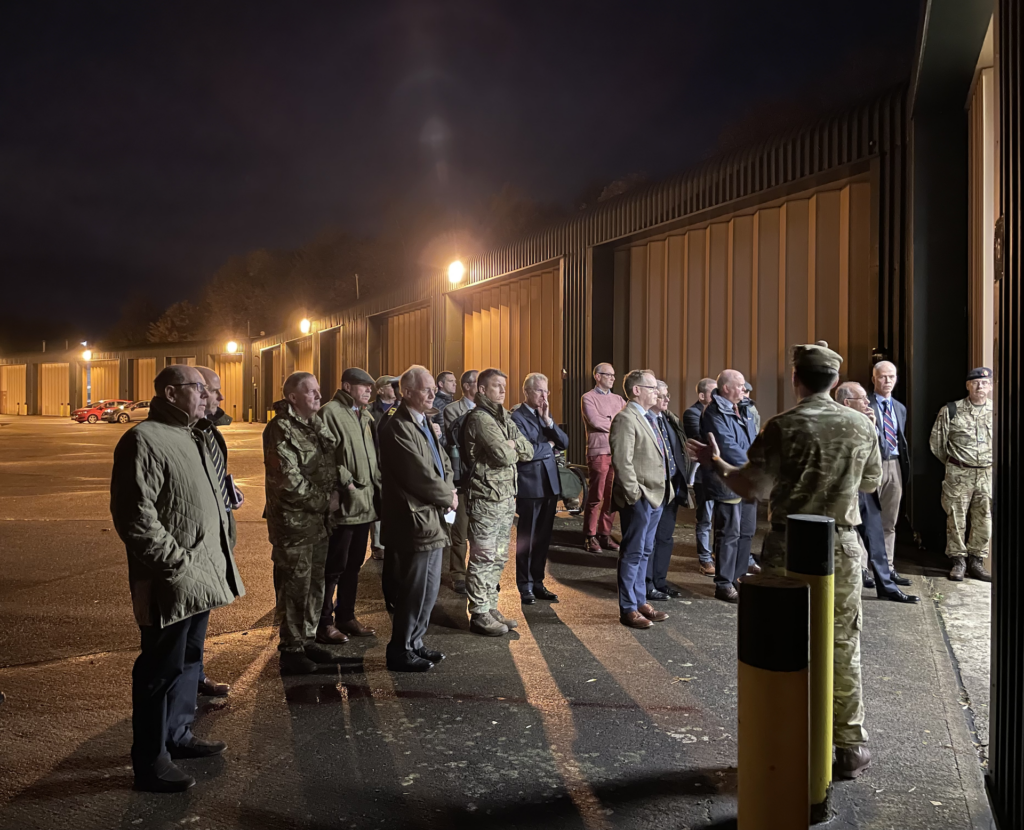 Unit representative briefing attendees outside