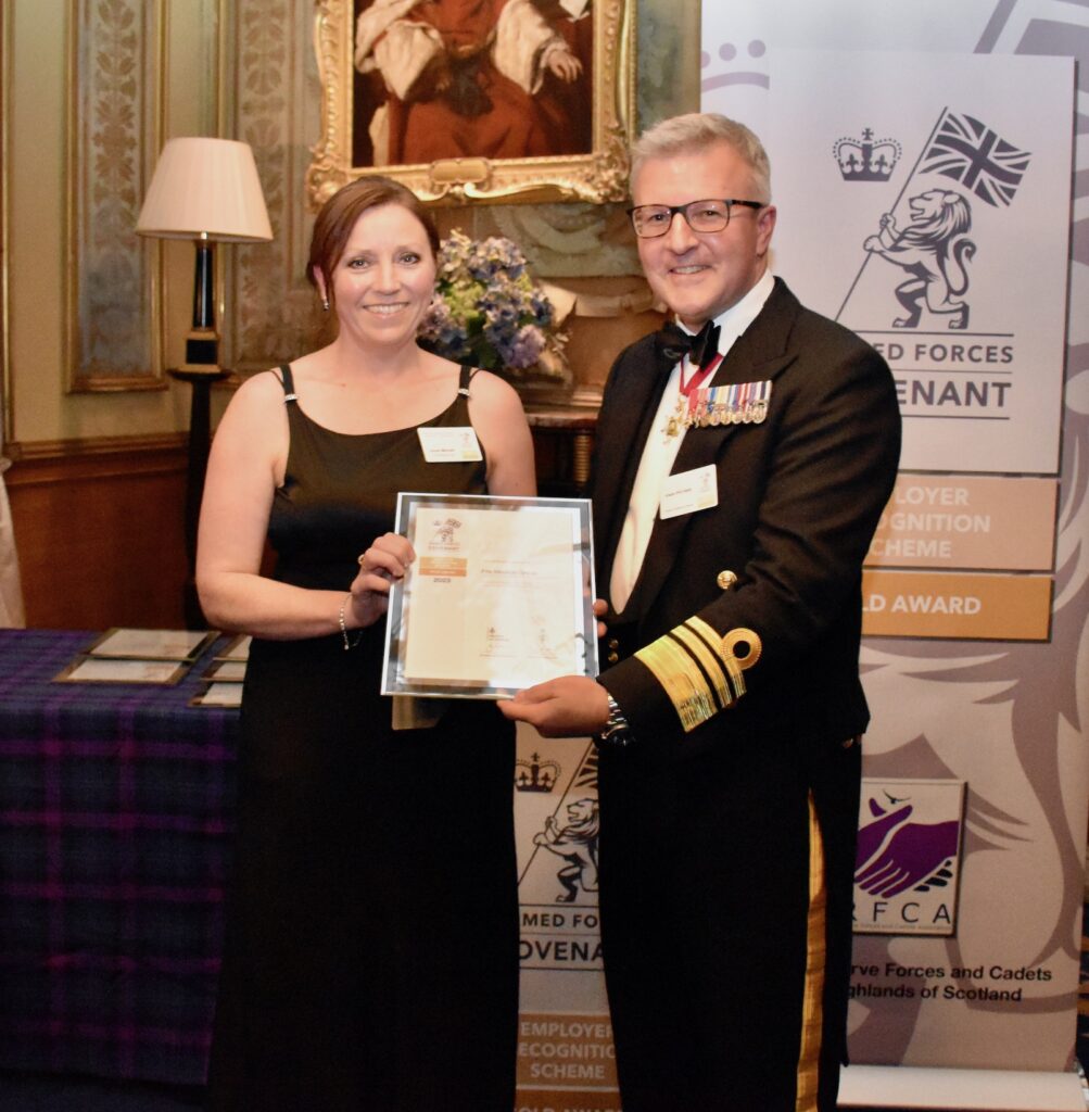 Fife Medical Group receiving the Award from Vice Admiral Hally.