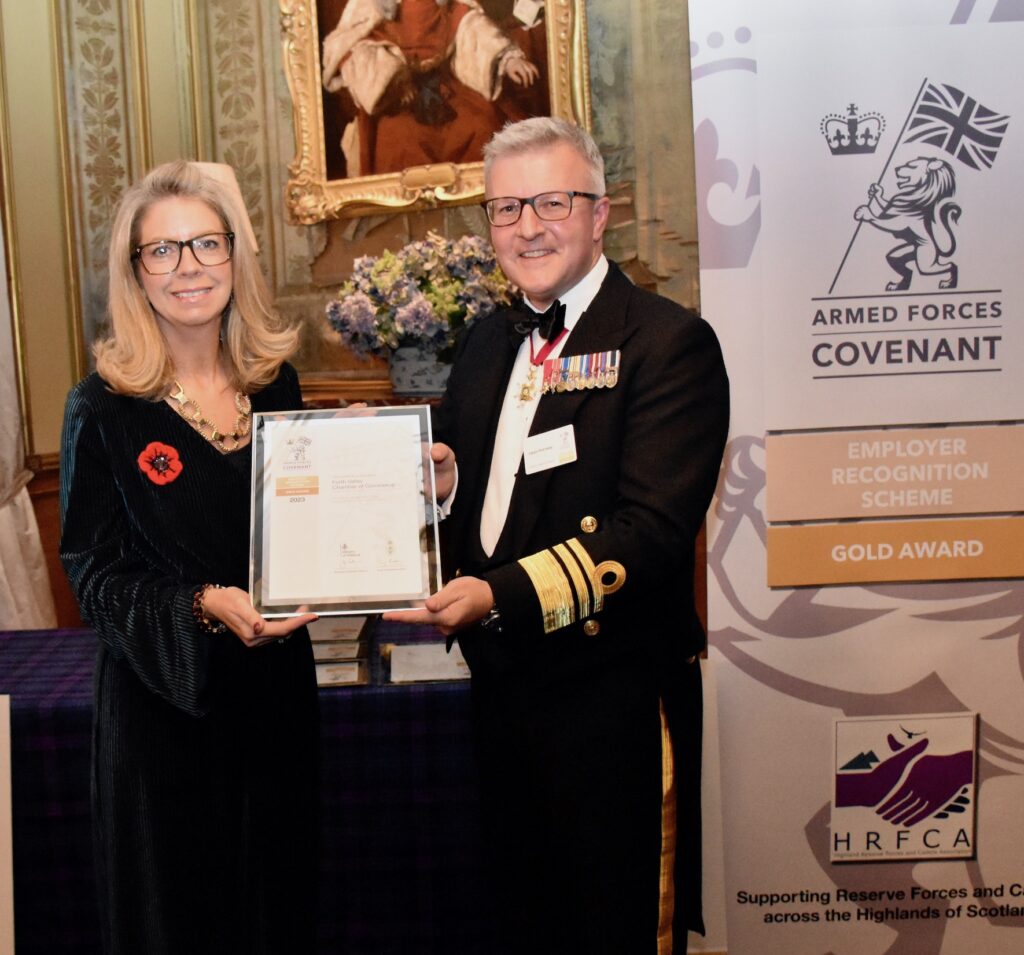 Forth Valley Chamber of Commerce Lynn Harris receives the Award from Vice Admiral Hally.