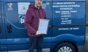 Robert Law of Moray Autocare Ltd with the ERS Bronze Award.