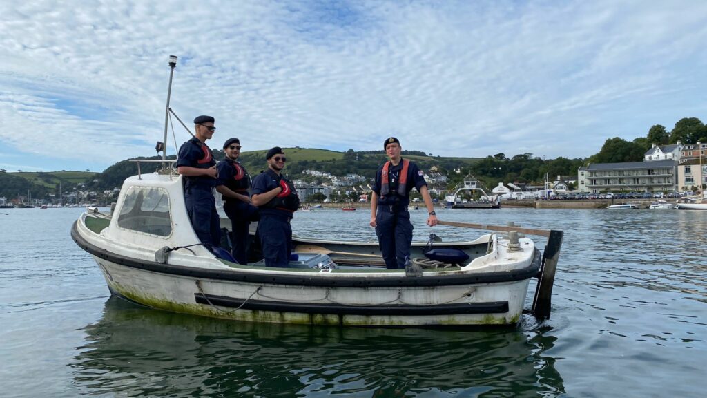 Officer Cadets in a small boat at Dartmouth.