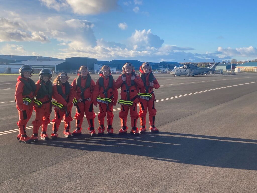 Unit staff on a runway.