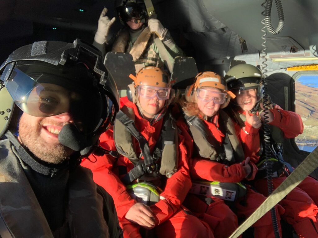 Officer Cadets in a helicopter.