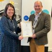 HRFCA's Ray Watt presents the Armed Forces Covenant certificate to Faye Fletcher of Spirit Energy.