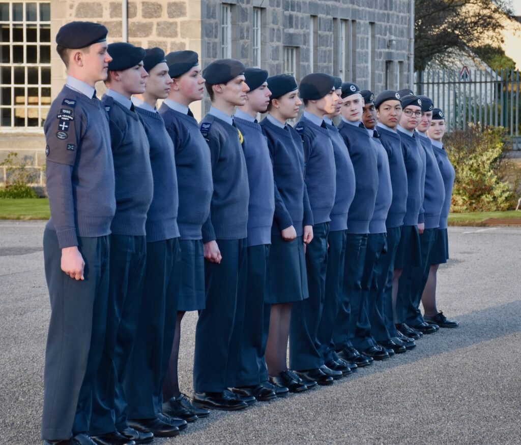 Cadets stand in a line.