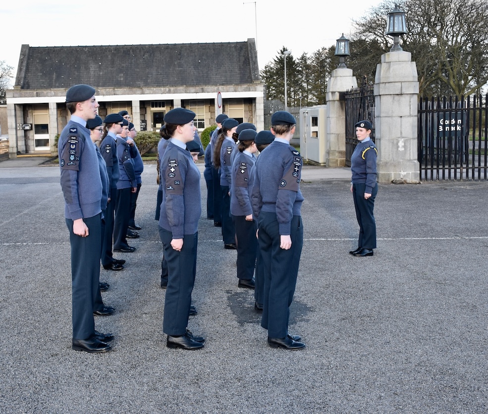 A group of cadets during a demonstration of drill skills.