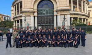 Group of Officer Cadets outside a building in Palermo, Sicily.