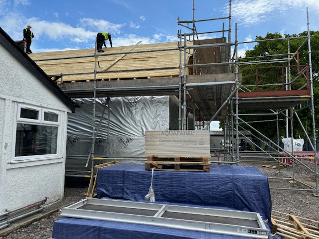 Work to clad the roof.