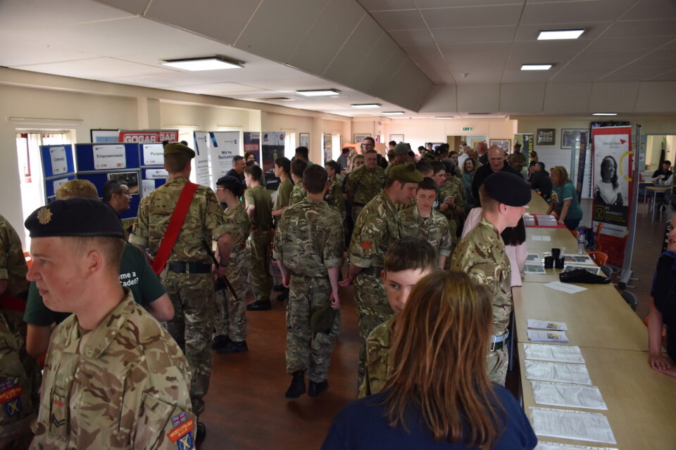 Room filled with employers and cadets.
