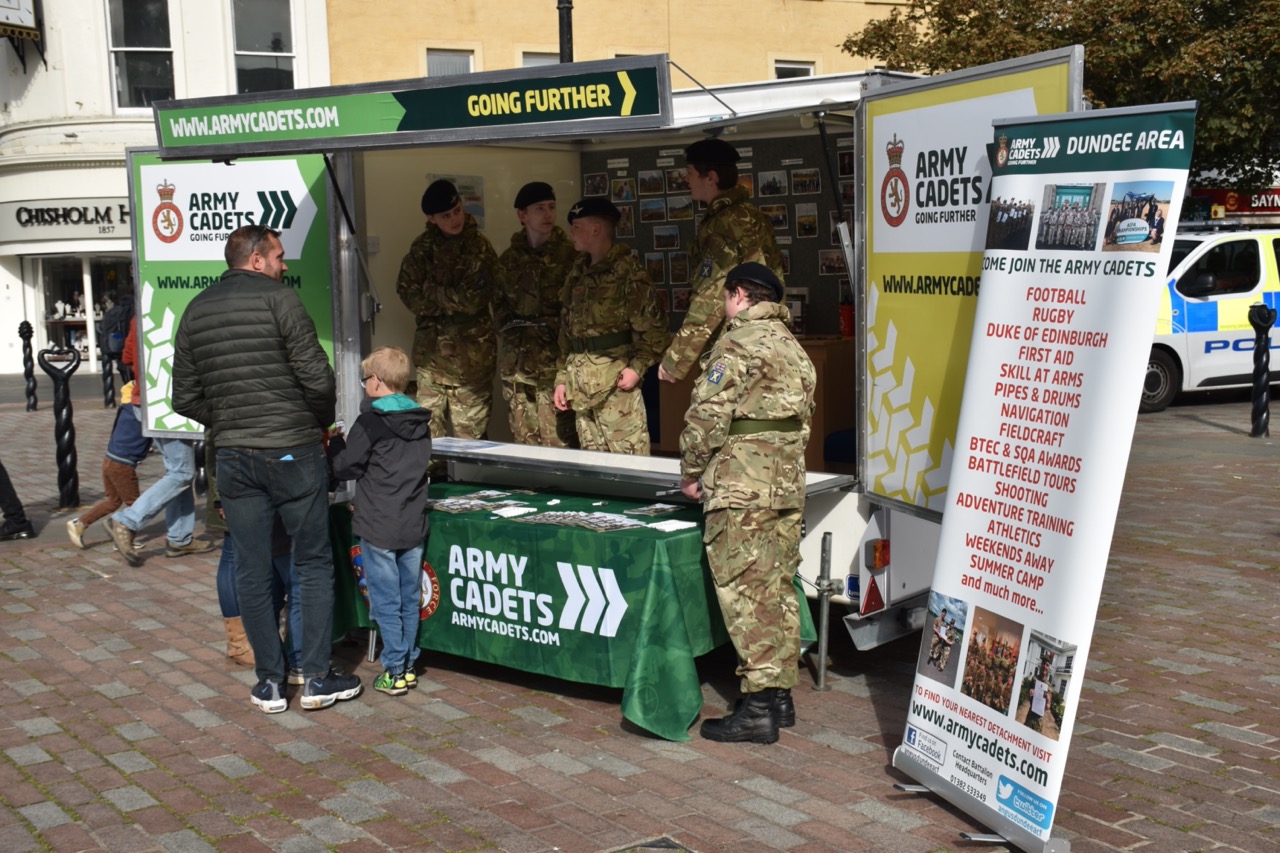 A family at the Army Cadets stand.