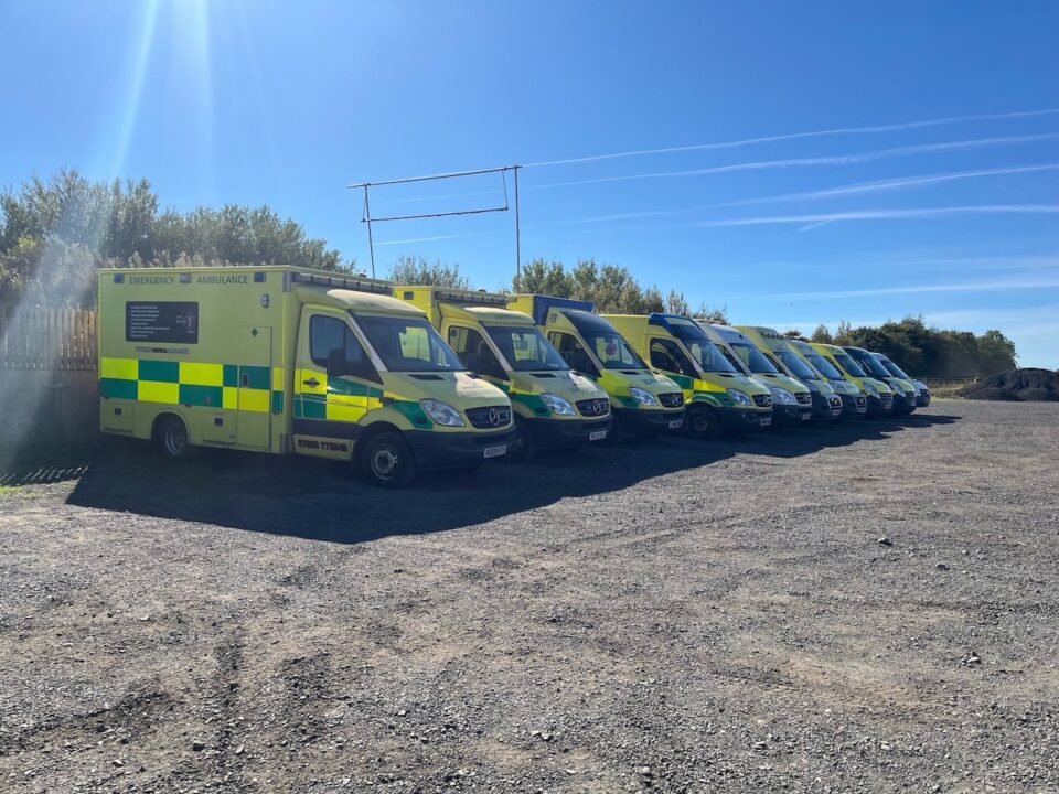 10 Fife Medical Group ambulances in a line.
