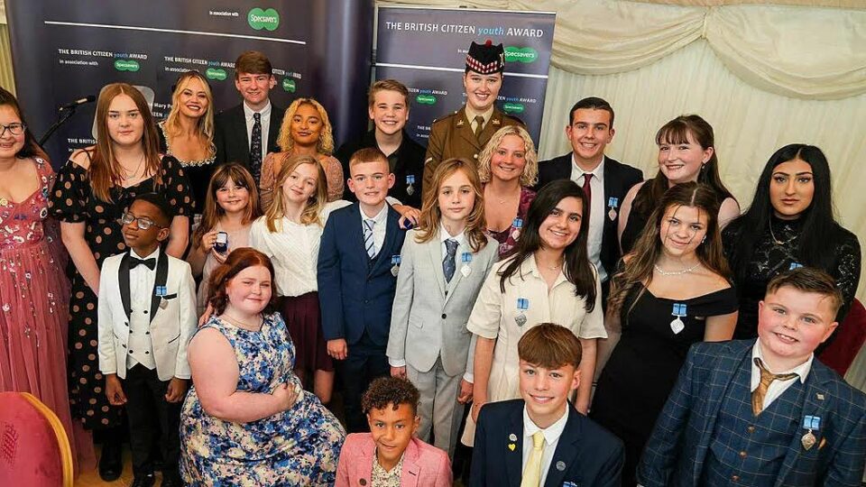 The 21 British Citizen Youth Award recipients pictured with host Kimberley Wyatt at Westminster, London.