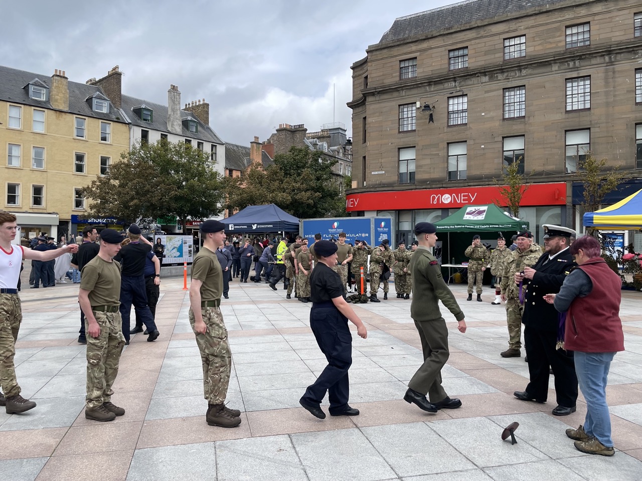 The Sea and Royal Marines Cadets team receiving their participation medals.