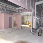 Mess areas running up one side of the drill hall.