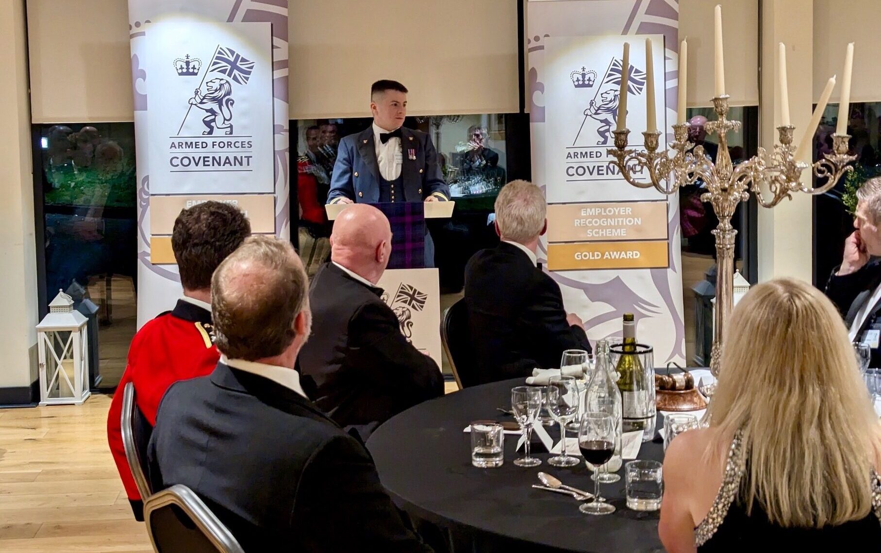 Cadet Force Adult Flight Lieutenant Matthew Smith talks to the guests about his experiences in the Royal Air Force Air Cadets.