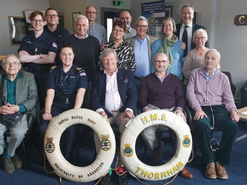 A dozen members of the Aberdeen URNU class of 1980-83 with current URNU East Scotland Officer Cadets.