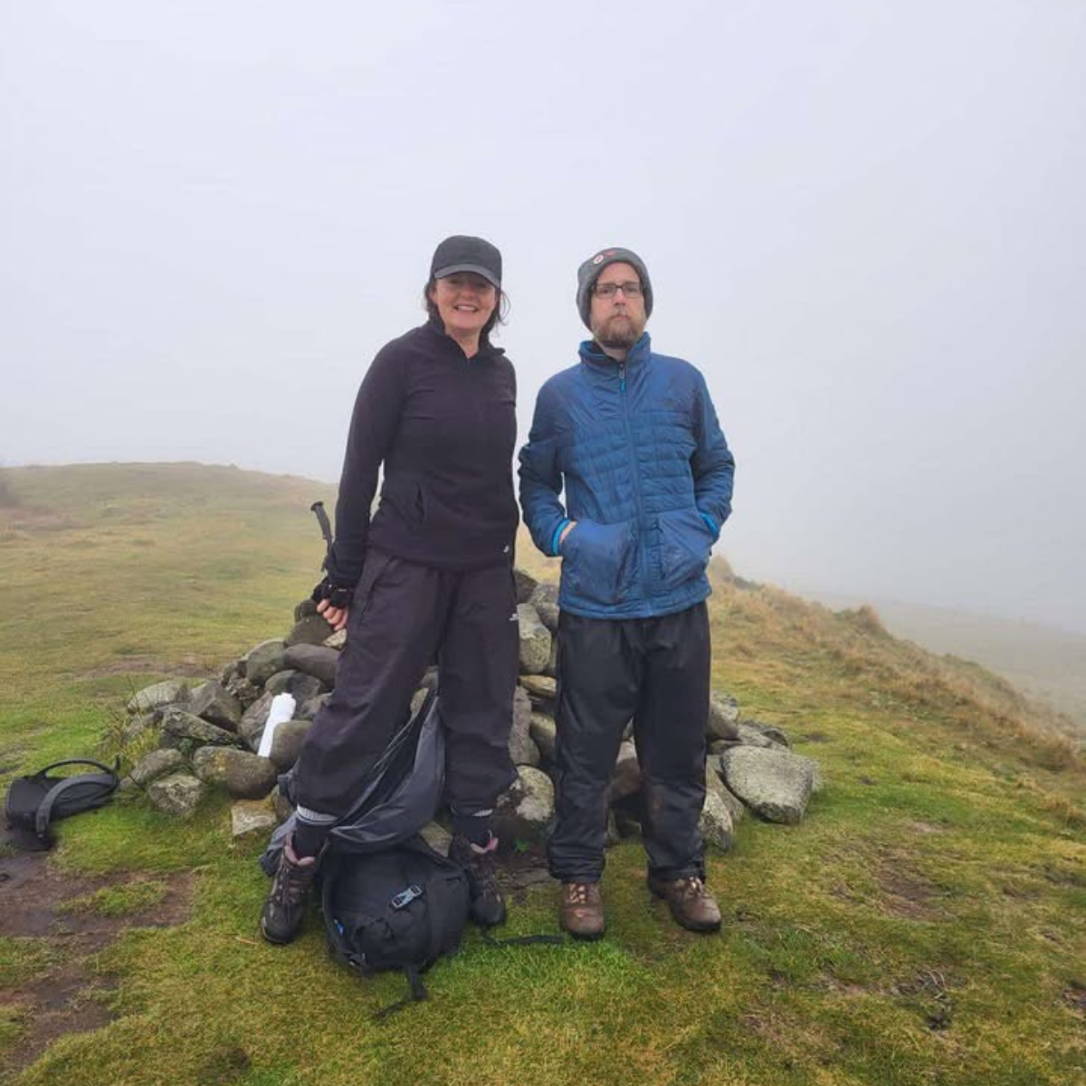 Carolyne French and her brother on a mountain.