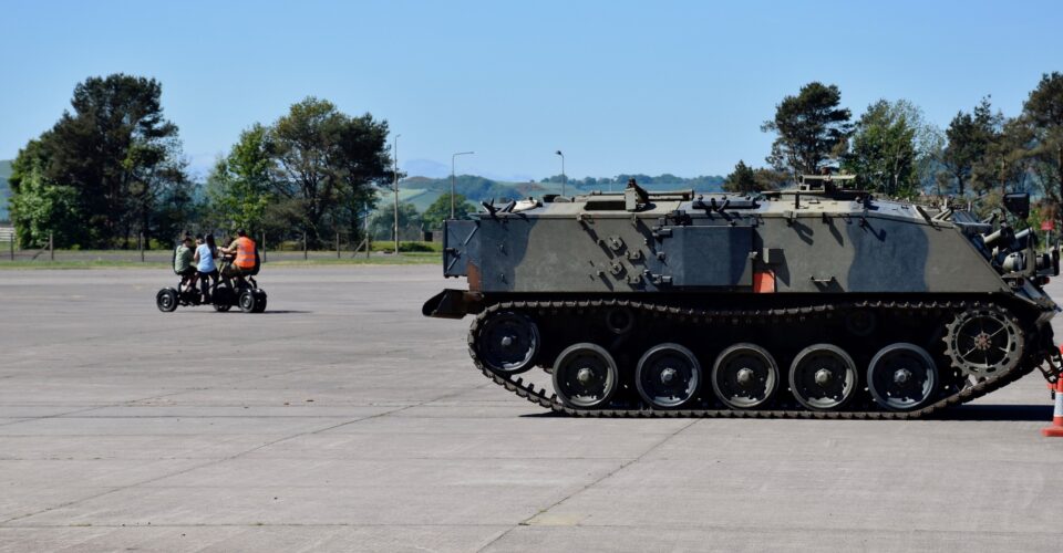 Pupils have a shot on a 'party' bike.